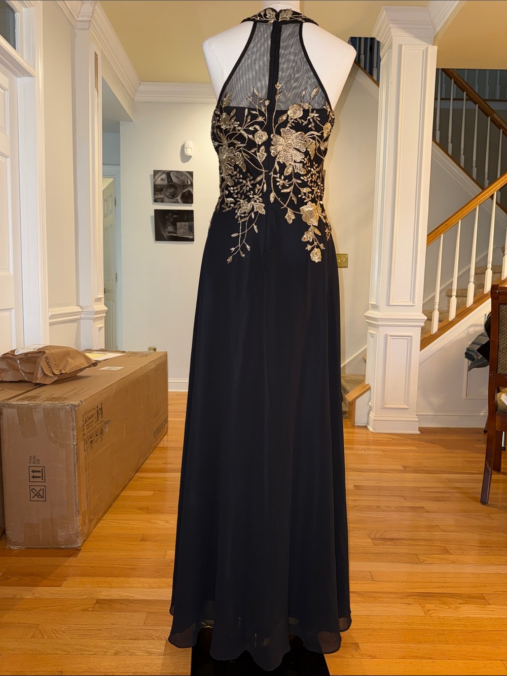 Betsy & AdamElegant Black Halter Evening Gown with Gold Floral Embroidery - Picture 3 of 5